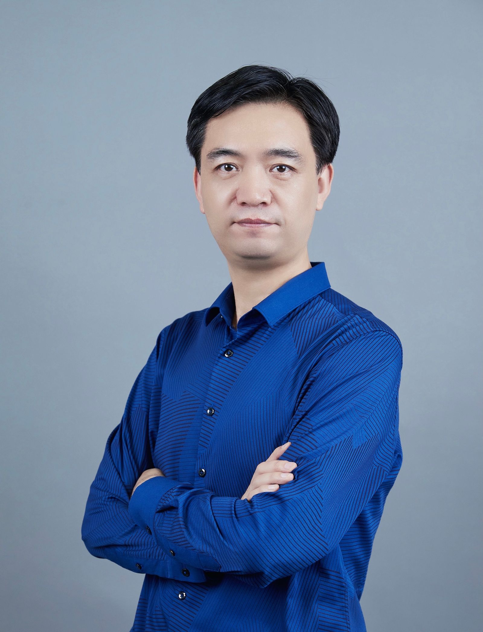 A headshot of Cainiao Group VP and General Manager of Logistics Technology Ding Hongwei